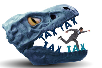 Businessman in the jaws of high taxes