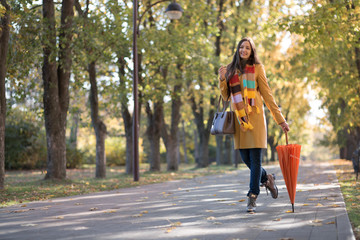 beautiful woman in autumn park