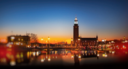 Dark colorful panoramic cityscape of Stockholm with the Townhall