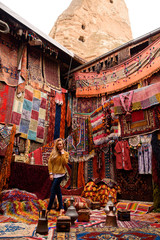 Woman in the Turkish carpet market