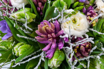 Elite bouquet of beautiful luxury flowers with twigs in hoarfrost style, close-up