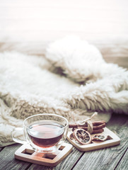 Still life cozy atmosphere with a cup of tea