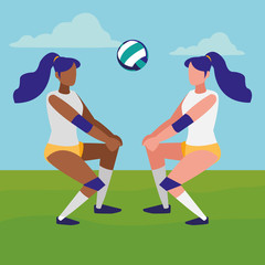 young girls playing volleyball