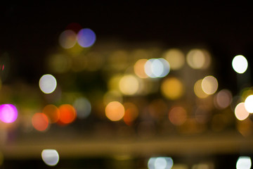 Artistic style - Defocused urban abstract texture ,bokeh of city lights in the background with...