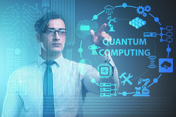 Businessman pressing virtual button in quantum computing concept
