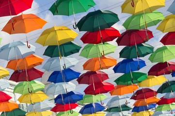 Fototapeta na wymiar Installation of hanging colored umbrellas