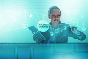 Businesswoman pressing virtual button in quantum computing concept