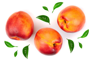 ripe nectarine with leaves isolated on white background. Top view. Flat lay pattern