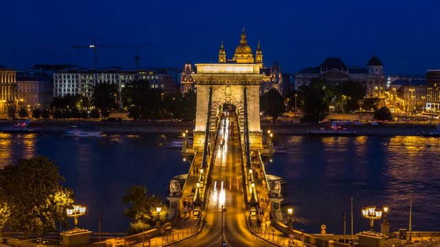 Time Lapse scene of traffic on the Chain Bridge in Budapest skyline at night. Filmed from the famous Adam Clark tunnel. 4K Scene