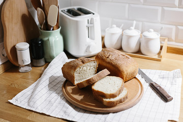 Homemade freshly baked bread on the kitchen table.