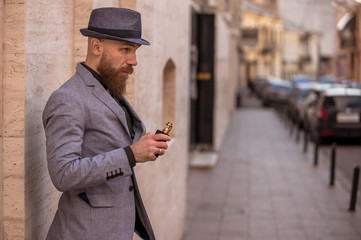 stylish bearded man in bloop wipe habit