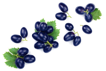 bue grapes wih leaves isolated on the white background with copy space for your text. Top view. Flat lay pattern