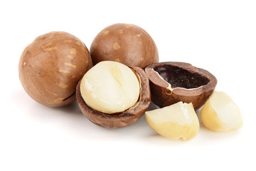Shelled and unshelled macadamia nuts isolated on white background