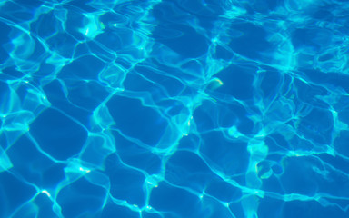 water in swimming pool rippled water detail background