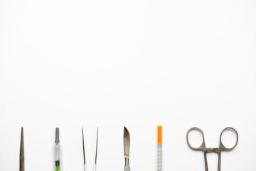 Set of cosmetical surgery equipment, flat lay on white background
