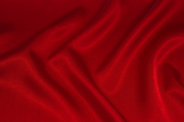 red satin or silk fabric as background