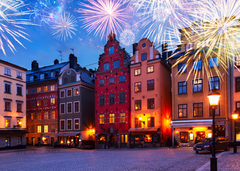Fototapeta na wymiar Gamla Stan stree at night with fiewworks, Stockholm, Sweden