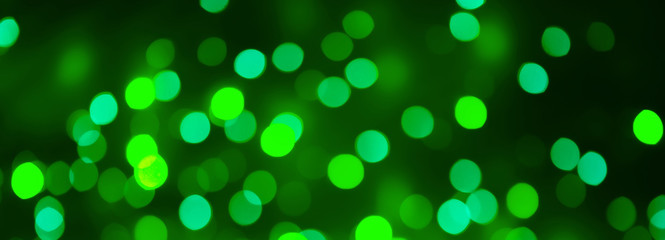 Obraz premium Beautiful panoramic green Christmas Holiday Bokeh Background