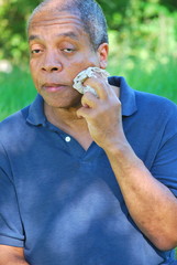 African american male sweating in the heatwave in Louisiana.