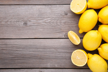 Fresh lemon on grey background. Tropical fruit.