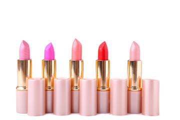 Obraz premium Colorful lipsticks isolated on white background