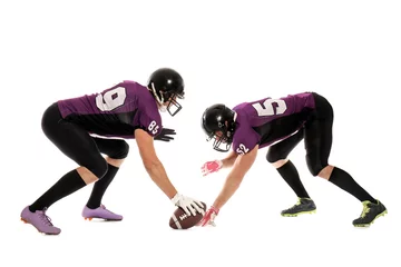 Fotobehang Men in uniform playing American football on white background © New Africa