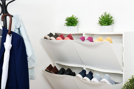 Shoe Cabinet With Footwear In Room. Storage Ideas