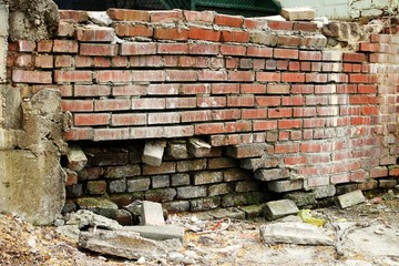 Brick wall falling apart.