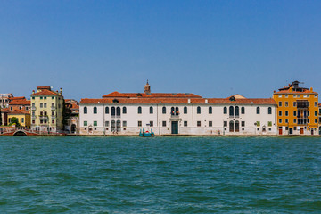 Fototapeta na wymiar Venetian houses over water in Venice, Italy