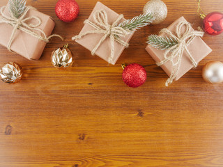 Flat lay,top view Christmas,new year ornaments and gift boxes on wooden background with copy space 