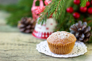 Christmas cupcake on the Christmas table.