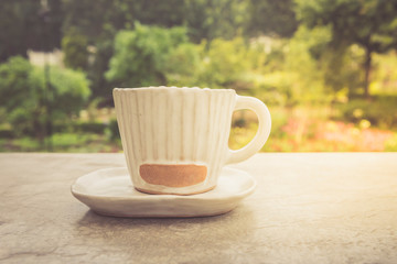 Morning coffee in garden.