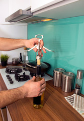 Man opening a bottle of wine