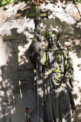 Historic Statue on the mystery old Prague Cemetery, Czech Republic