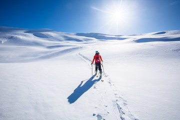 Fototapeta na wymiar Ski Touring in mountains.