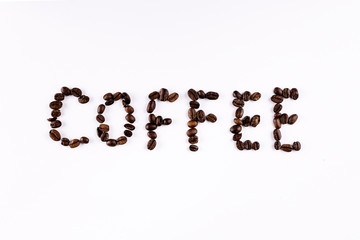 Coffee written with coffee beans