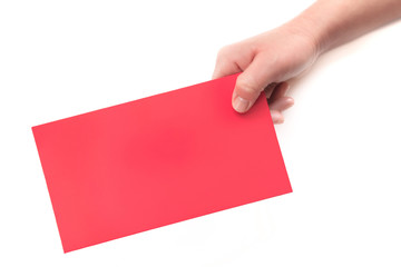 A close-up of a red envelope (red card) in a white background in one hand