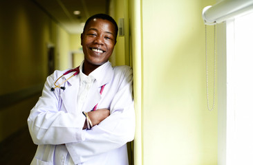 Happy doctor at a hospital