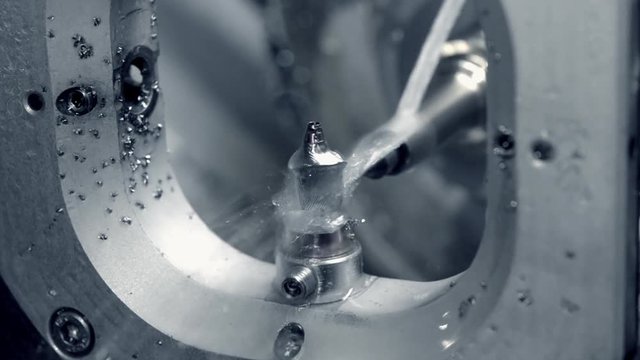 Milling abutment close-up. Cutting and milling of titanium abutment crown base for dental implant. Modern technology cad cam