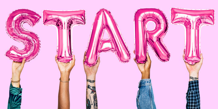 Hands holding start word balloon