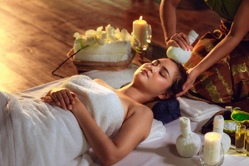 Portrait of Asian woman is relaxing in spa massage, Thai massage