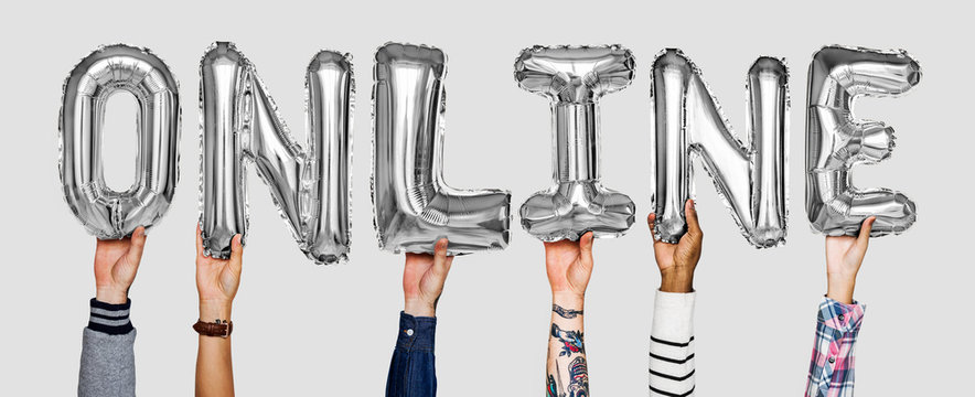 Hands showing online balloons word - Powered by Adobe