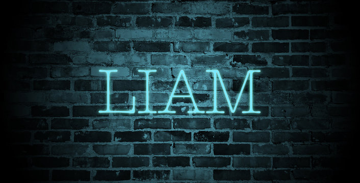 first name Liam in blue neon on brick wall