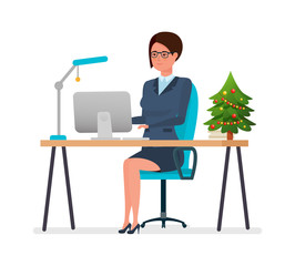 Girl working at computer in office, on eve of Christmas.