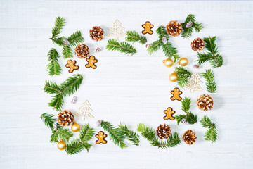 Christmas decorations on white wooden background.