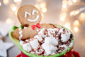Gingerbread cookie man in a hot chocolate