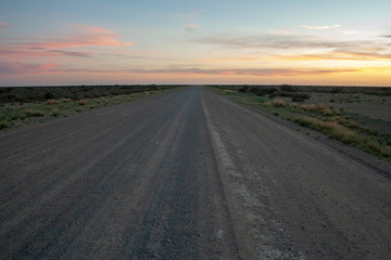 Fototapeta na wymiar Open road heading into the sunset, Patagonia, South America