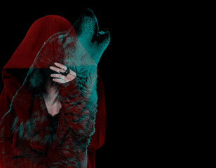 Red riding hood and howling wolf isolated on black background. double exposure