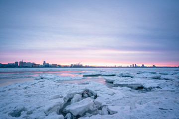 Ice on the Amur river at dusk. Blagoveshchensk