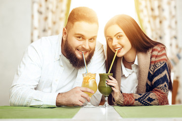 Portrait of a happy young couple in a restaurant
